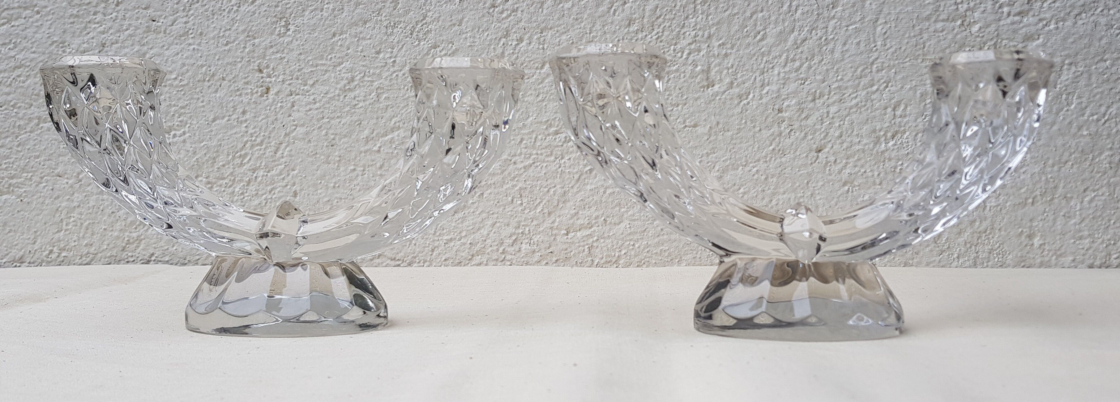 70s chiseled crystal chandelier duo