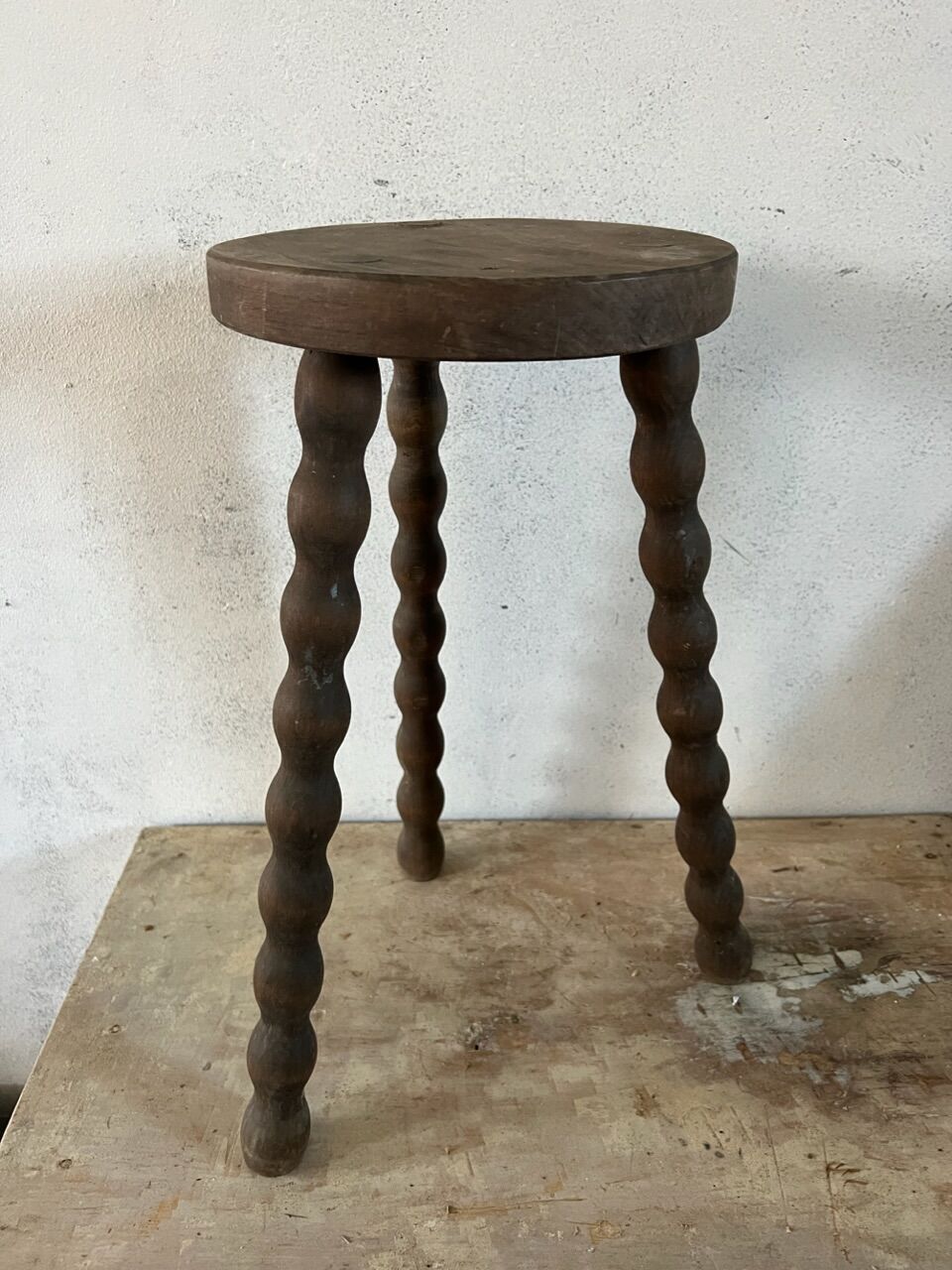 Tripod stool with turned feet