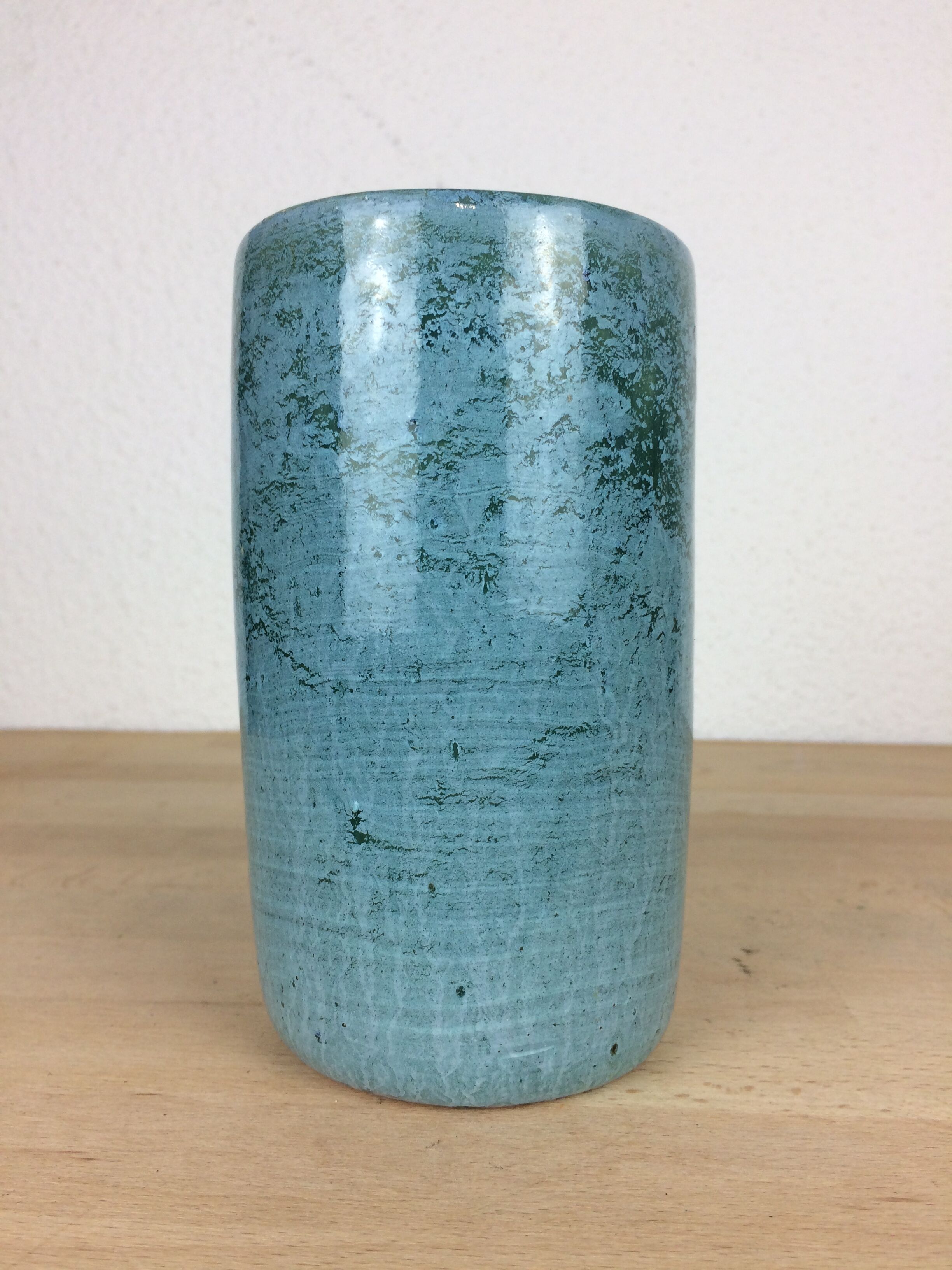Blue ceramic roller vase