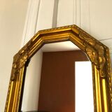 Old slim golden mirror