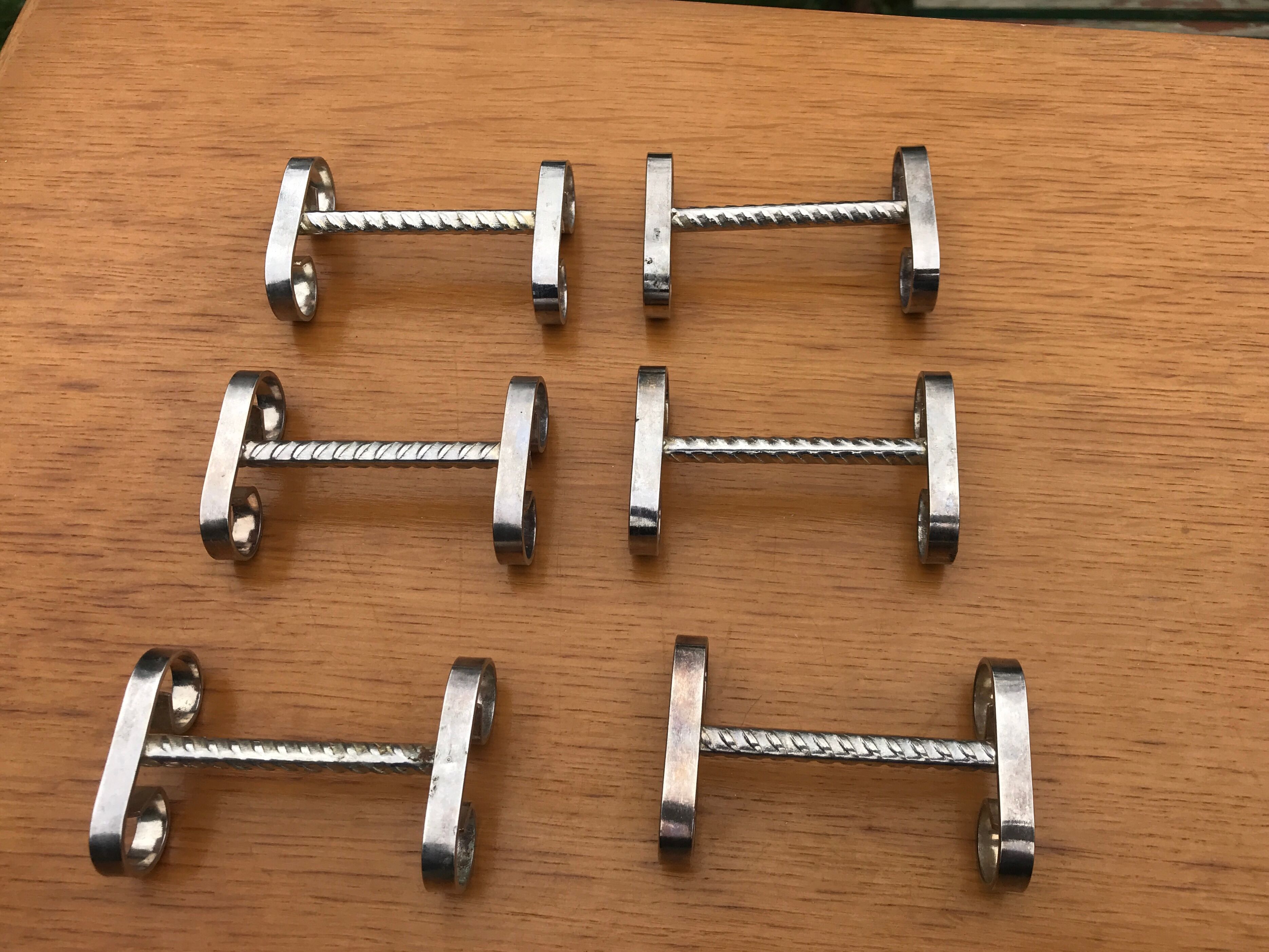 6 vintage silver metal knife holders from the 1960s