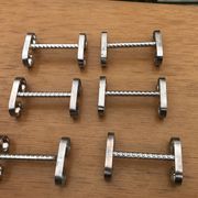 6 vintage silver metal knife holders from the 1960s