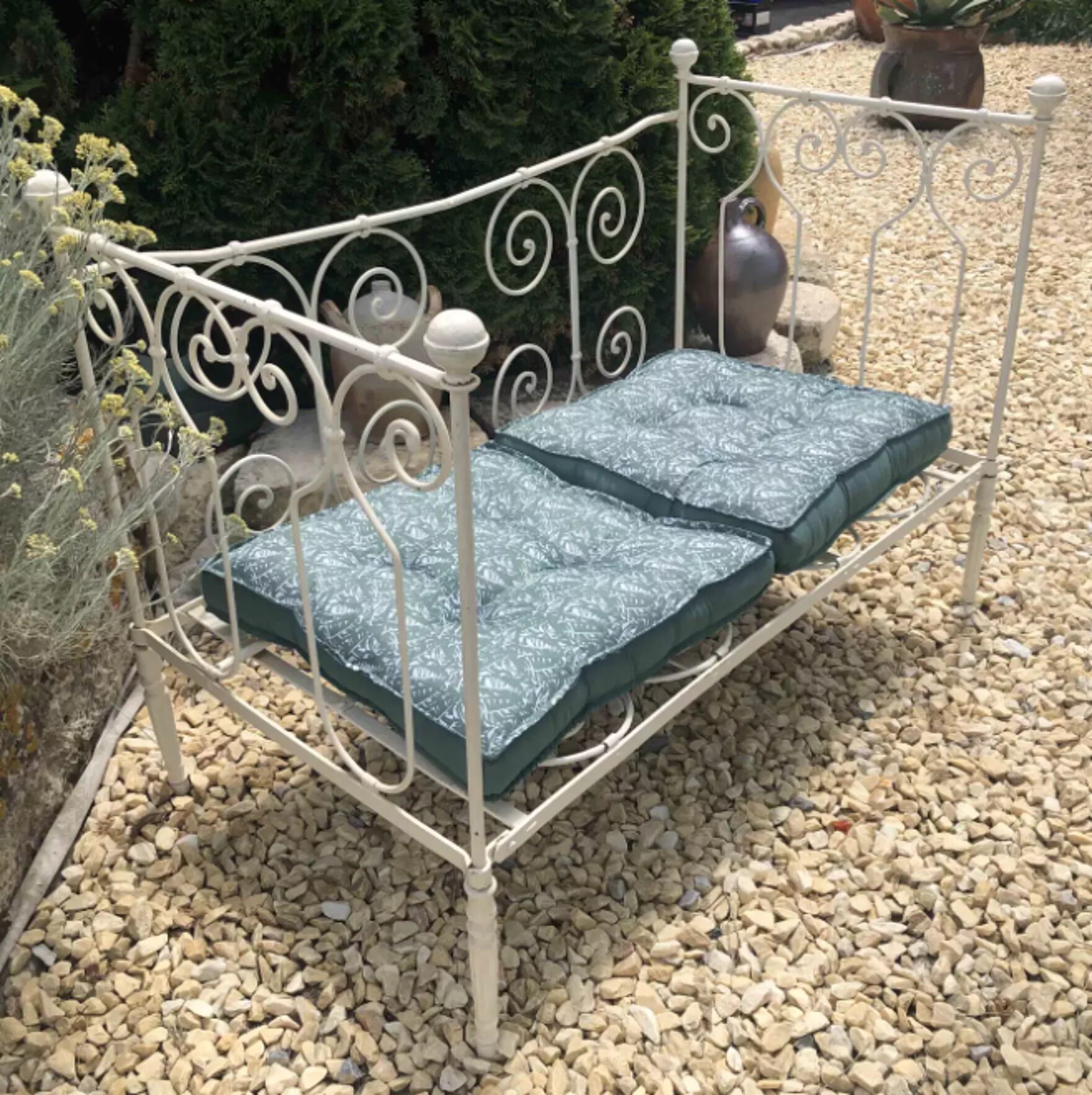 White wrought iron bed