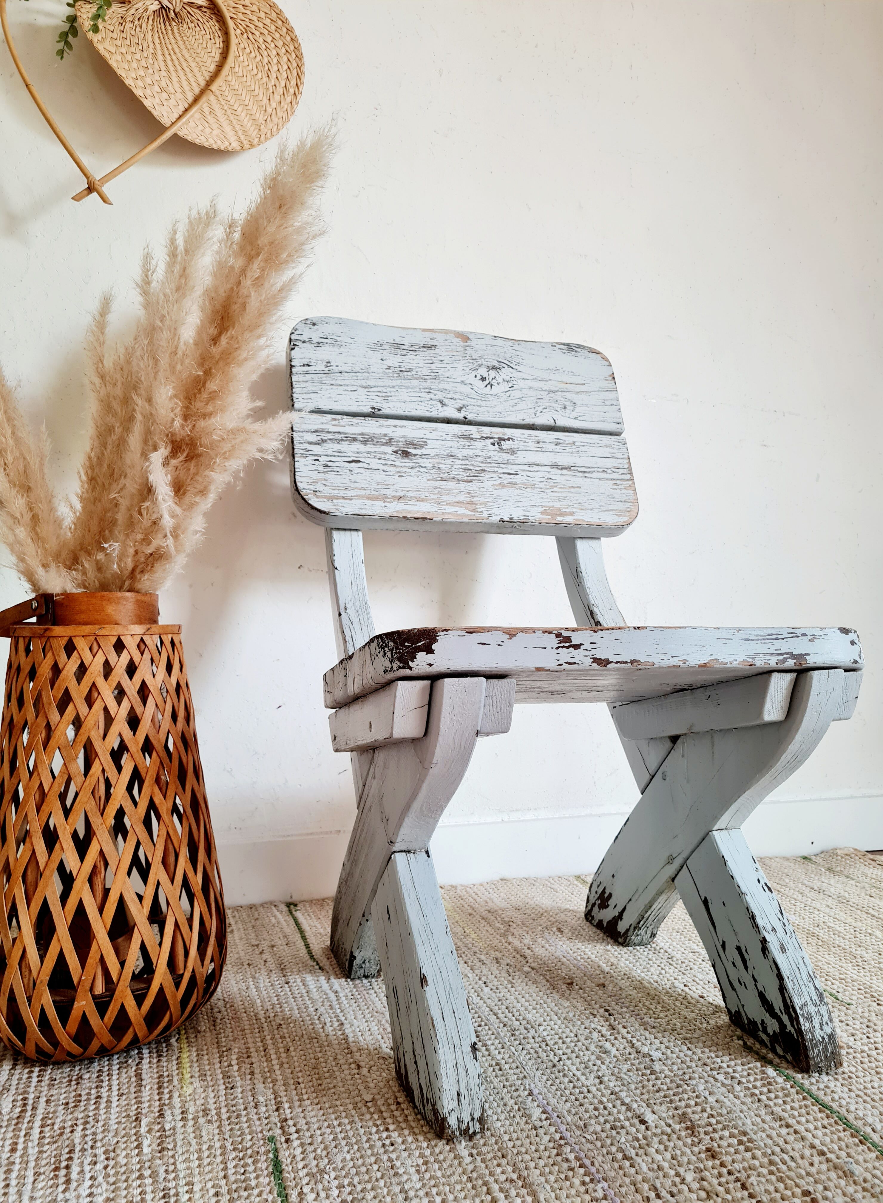 Patinated white old garden chair