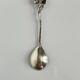 Silver spoon with amber