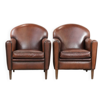 Set of 2  sheepskin art deco design armchairs with warm colours