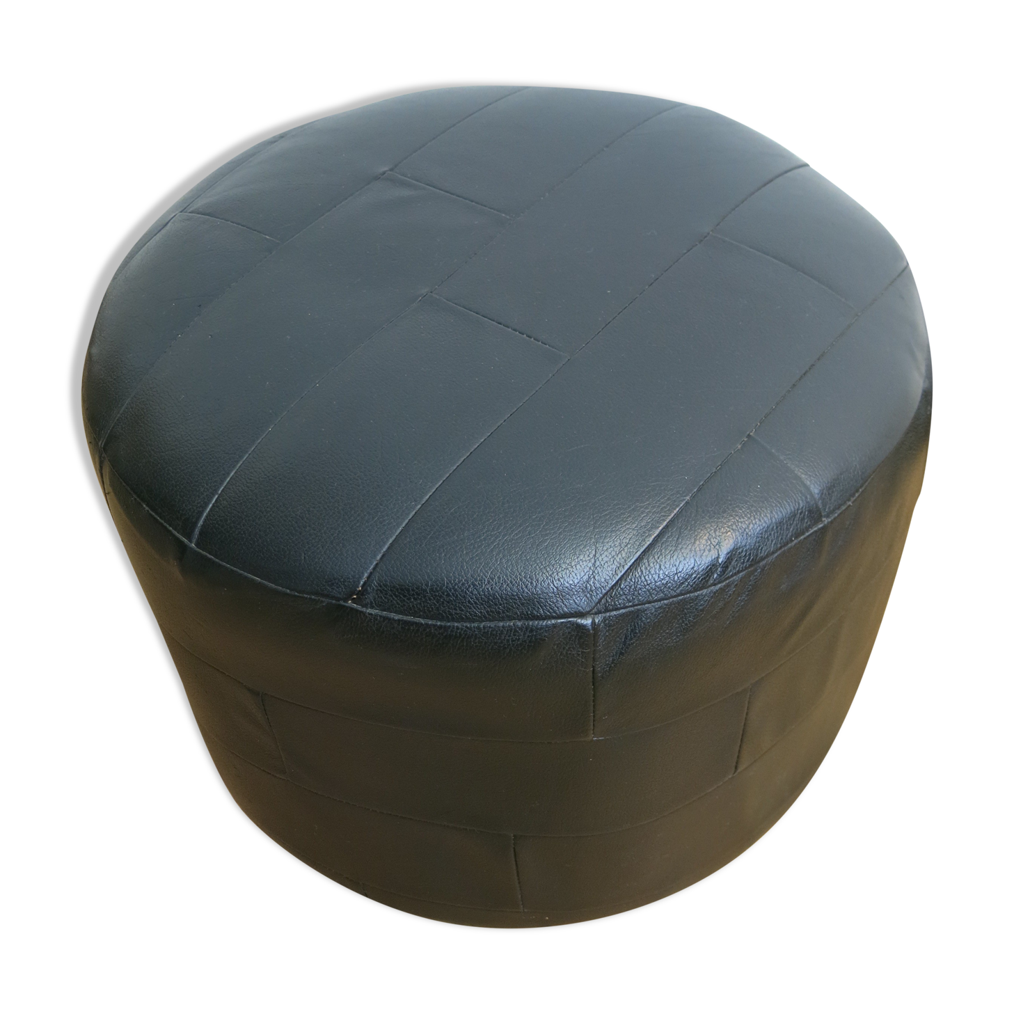Retro pouf in black leather