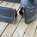 Antique cast iron fireplace andirons: bust of a garçonne