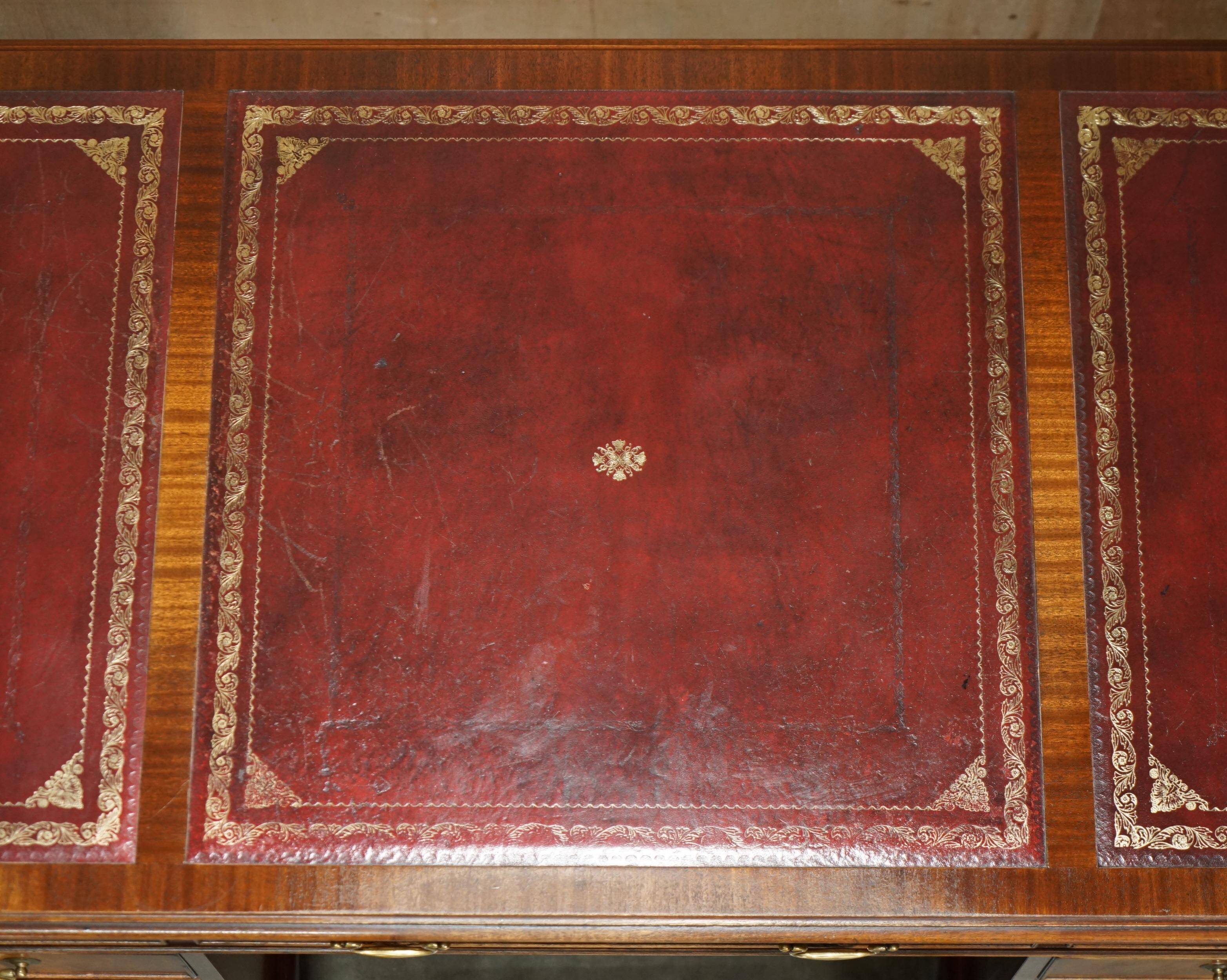 Partner desk Bevan Funnell in hardwood with leather top and gold leaf gilding.