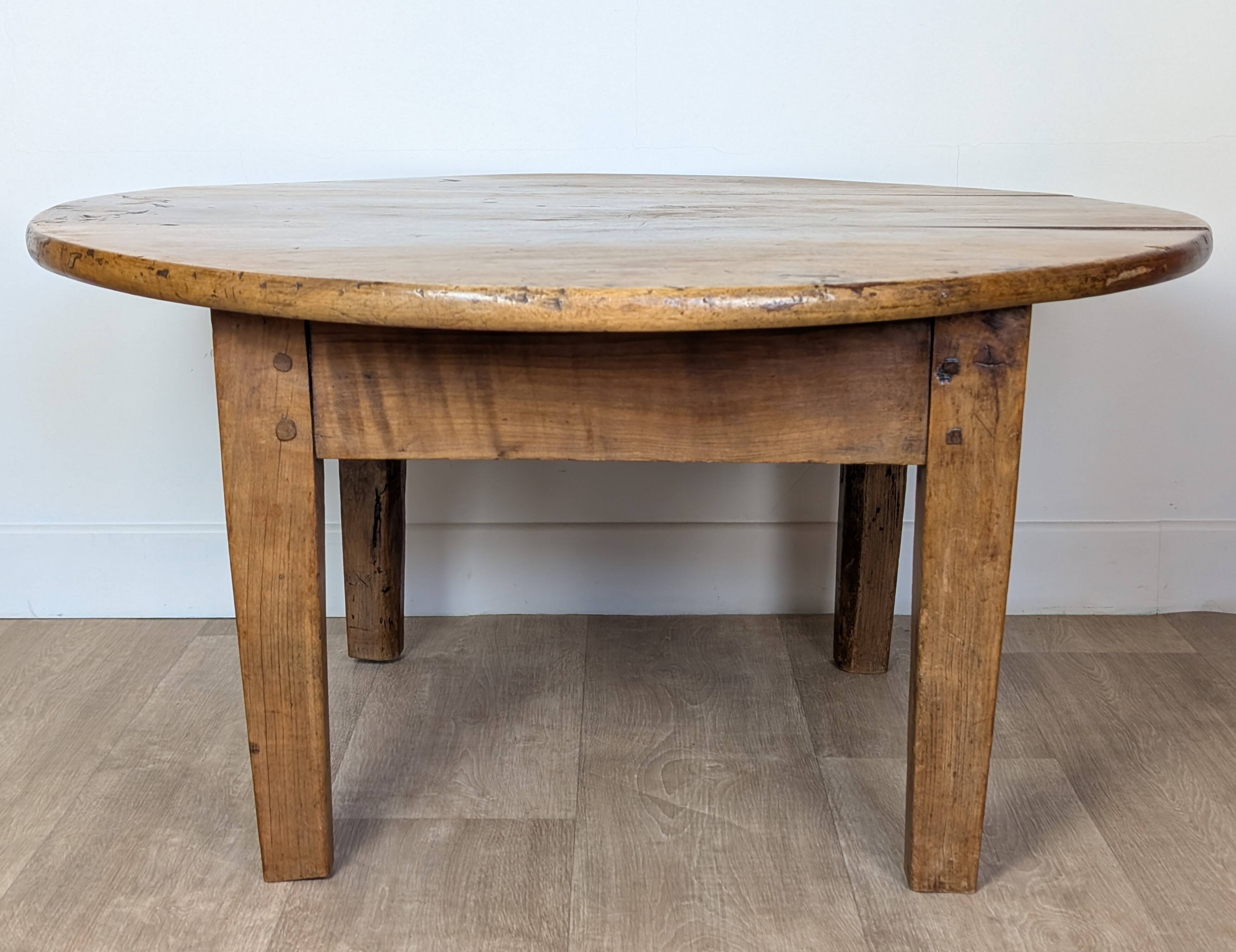 Round walnut coffee table
