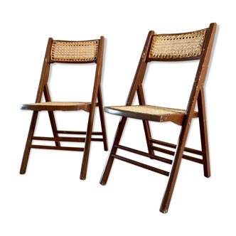 Paire de chaises pliantes en bois et cannage