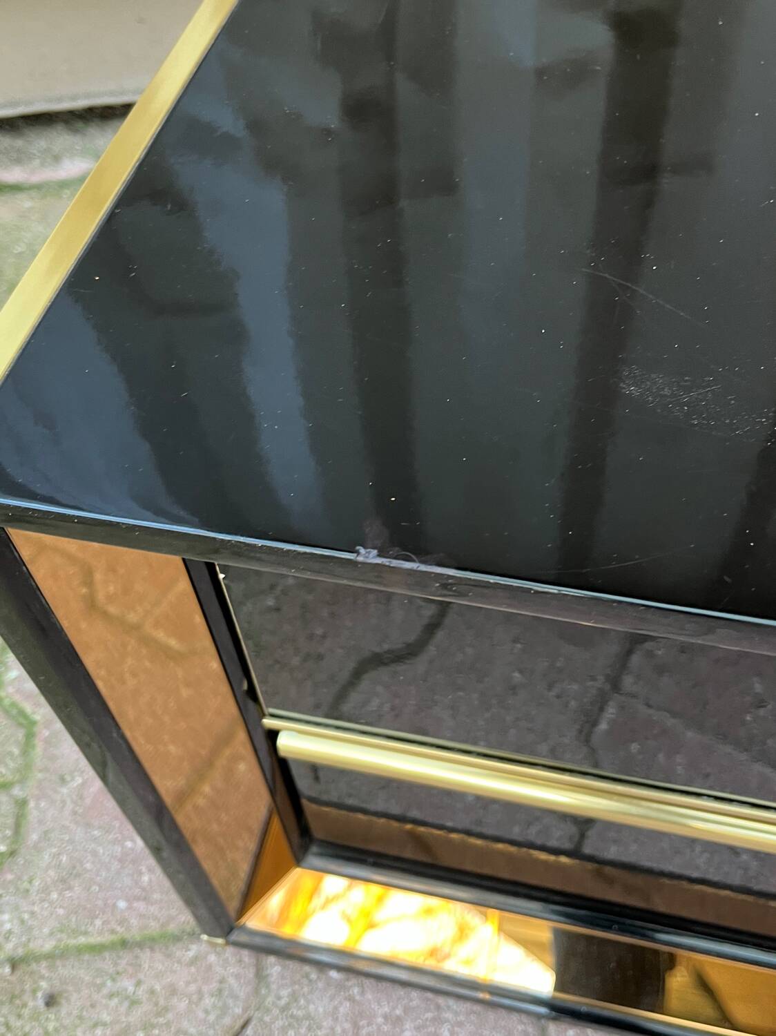 Two lacquered bedside tables.