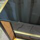 Two lacquered bedside tables.