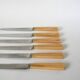 set of 6 large bakelite toothed knives 1960