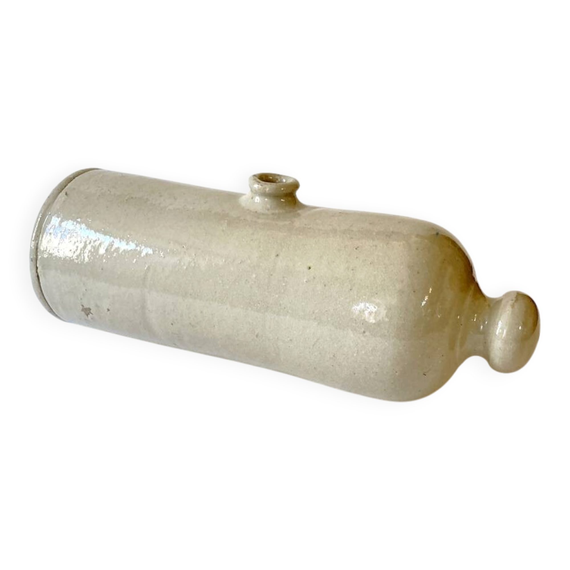 Old horizontal glazed stoneware hot water bottle, late 19th century.