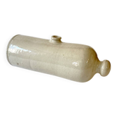 Old horizontal glazed stoneware hot water bottle, late 19th century.
