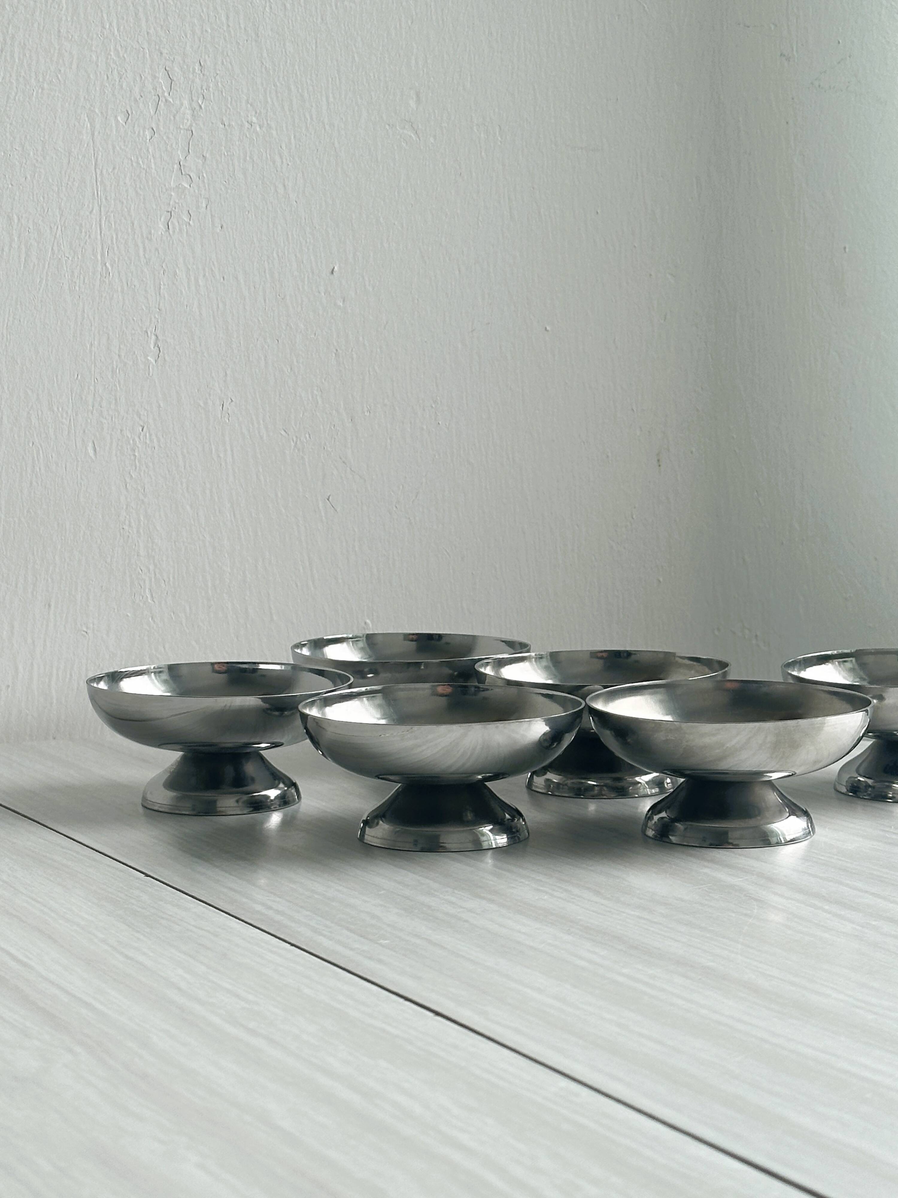 6 stainless steel dessert cups.