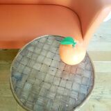 Old bamboo/rattan table with woven palm leaves.