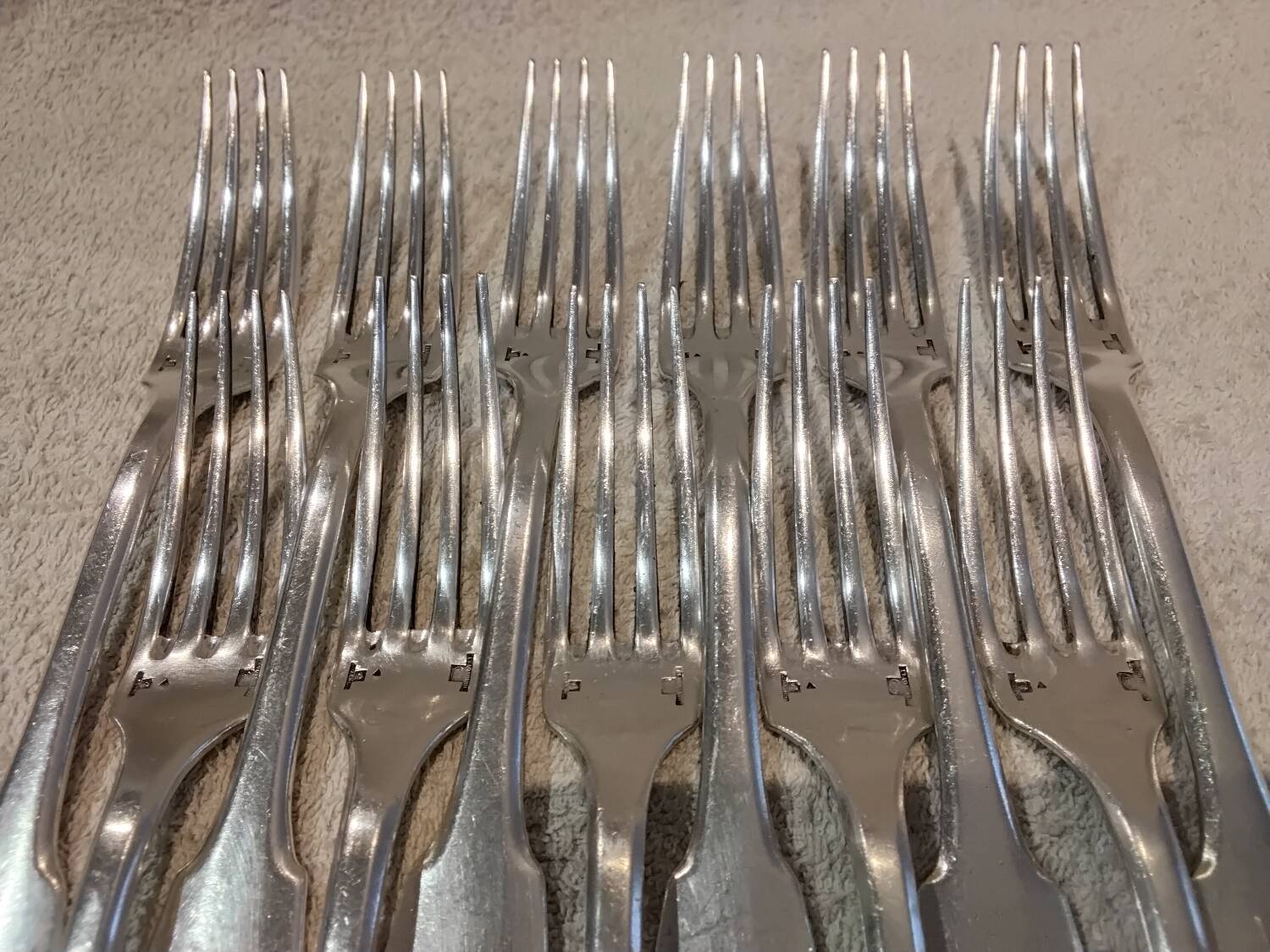 11 silver-plated table forks by Christofle Cluny with stripes