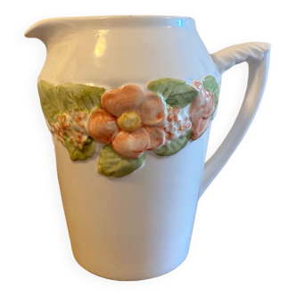 Pretty peach colored flower carafe