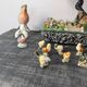 Set of 11 miniature birds in polychrome glazed ceramic.