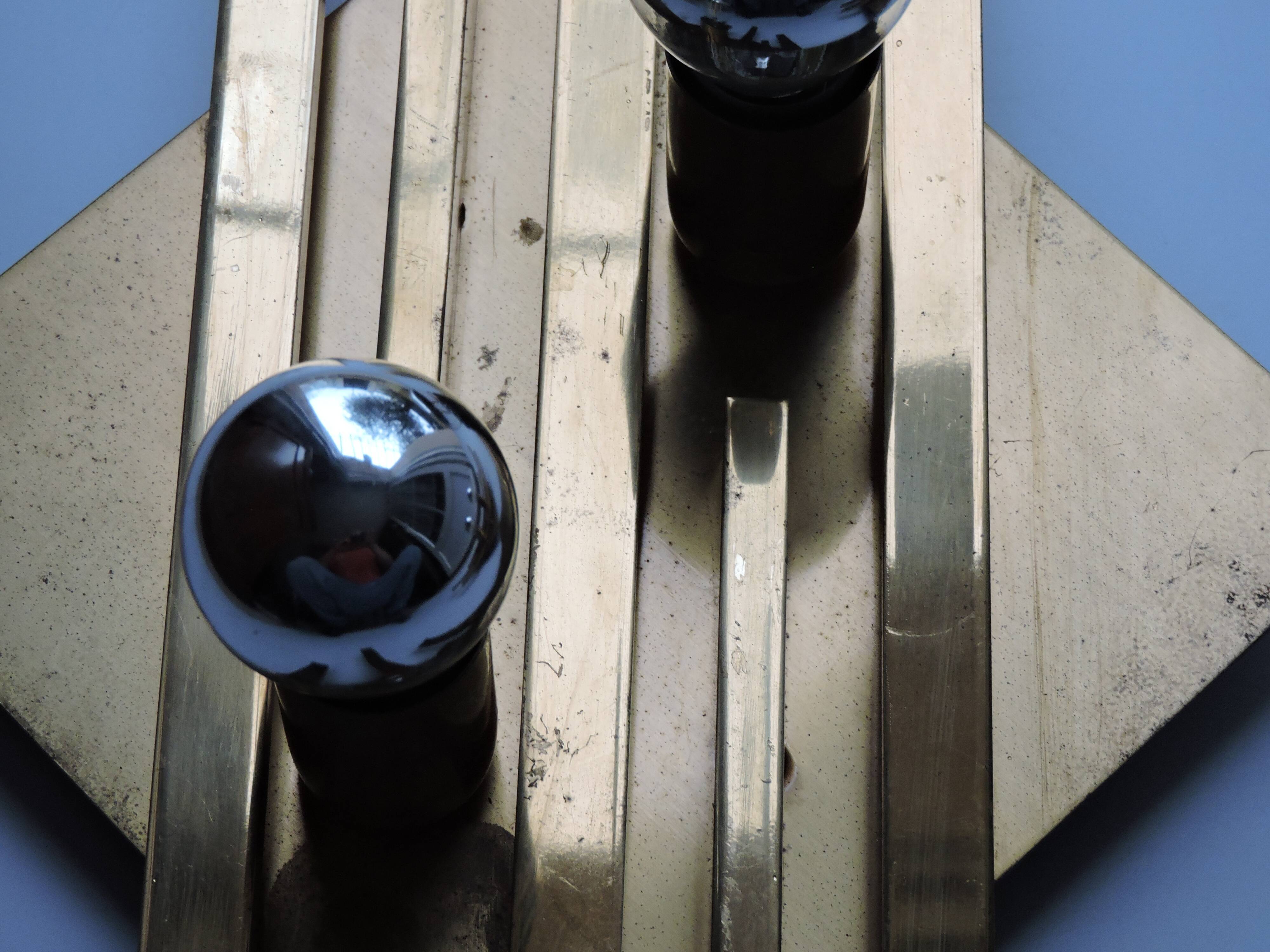 Pair of vintage geometric brass wall lamps