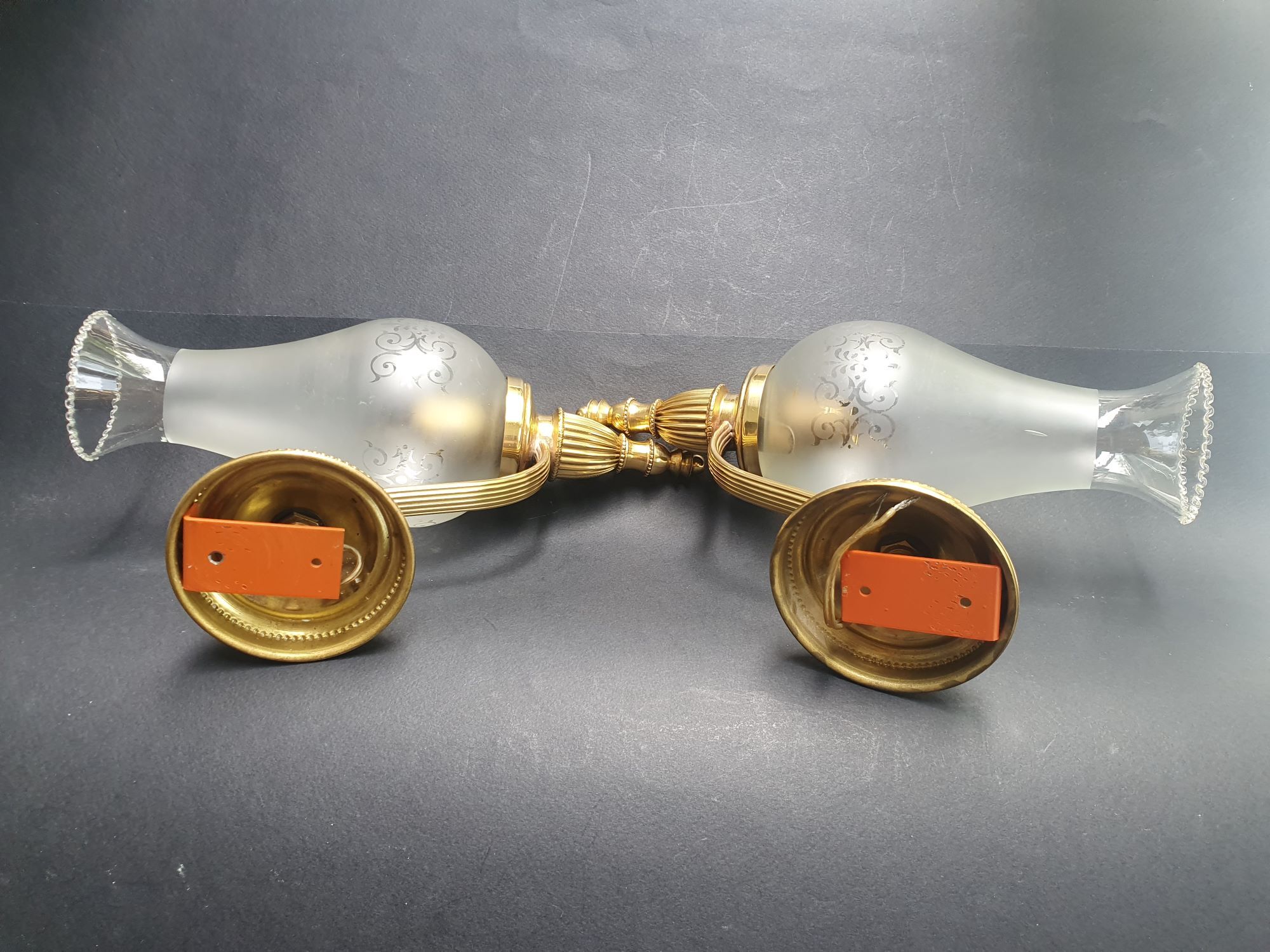 Pair of antique gold wall sconces