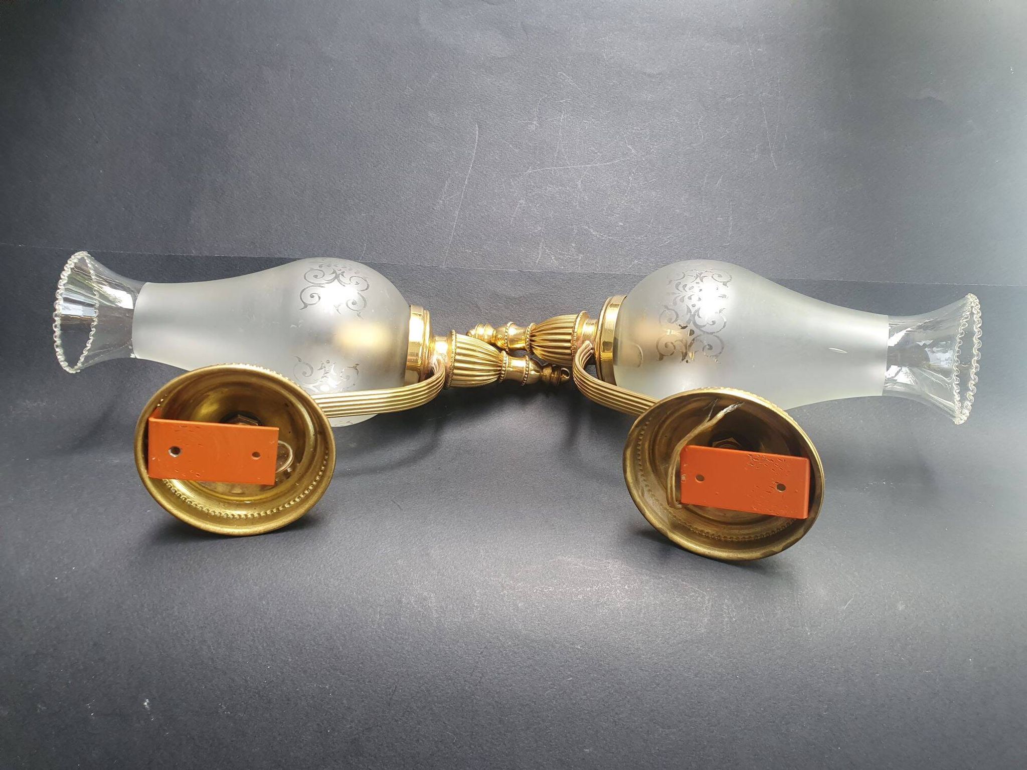 Pair of antique gold wall sconces