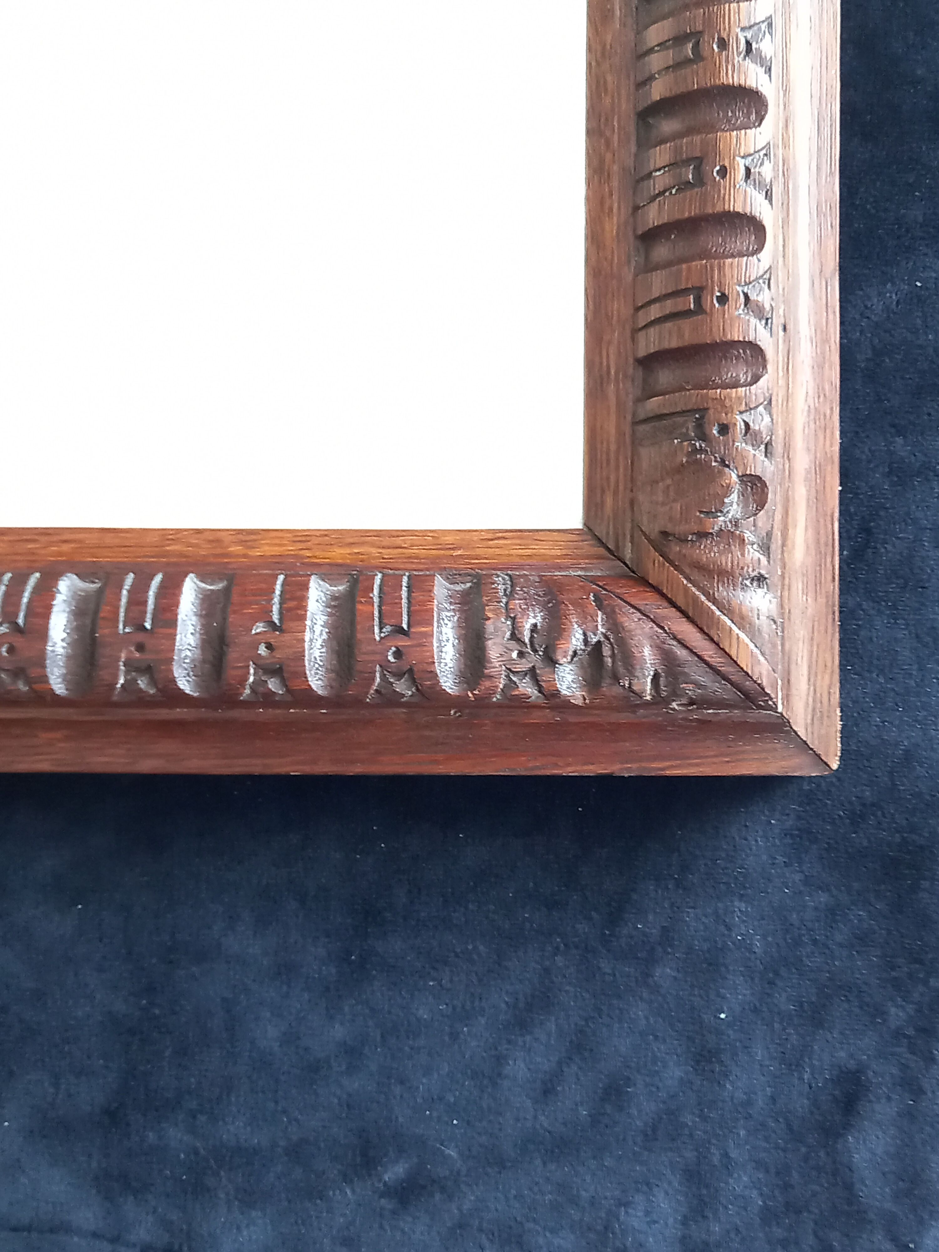 Rectangular mirror of neo-renaissance style in carved oak