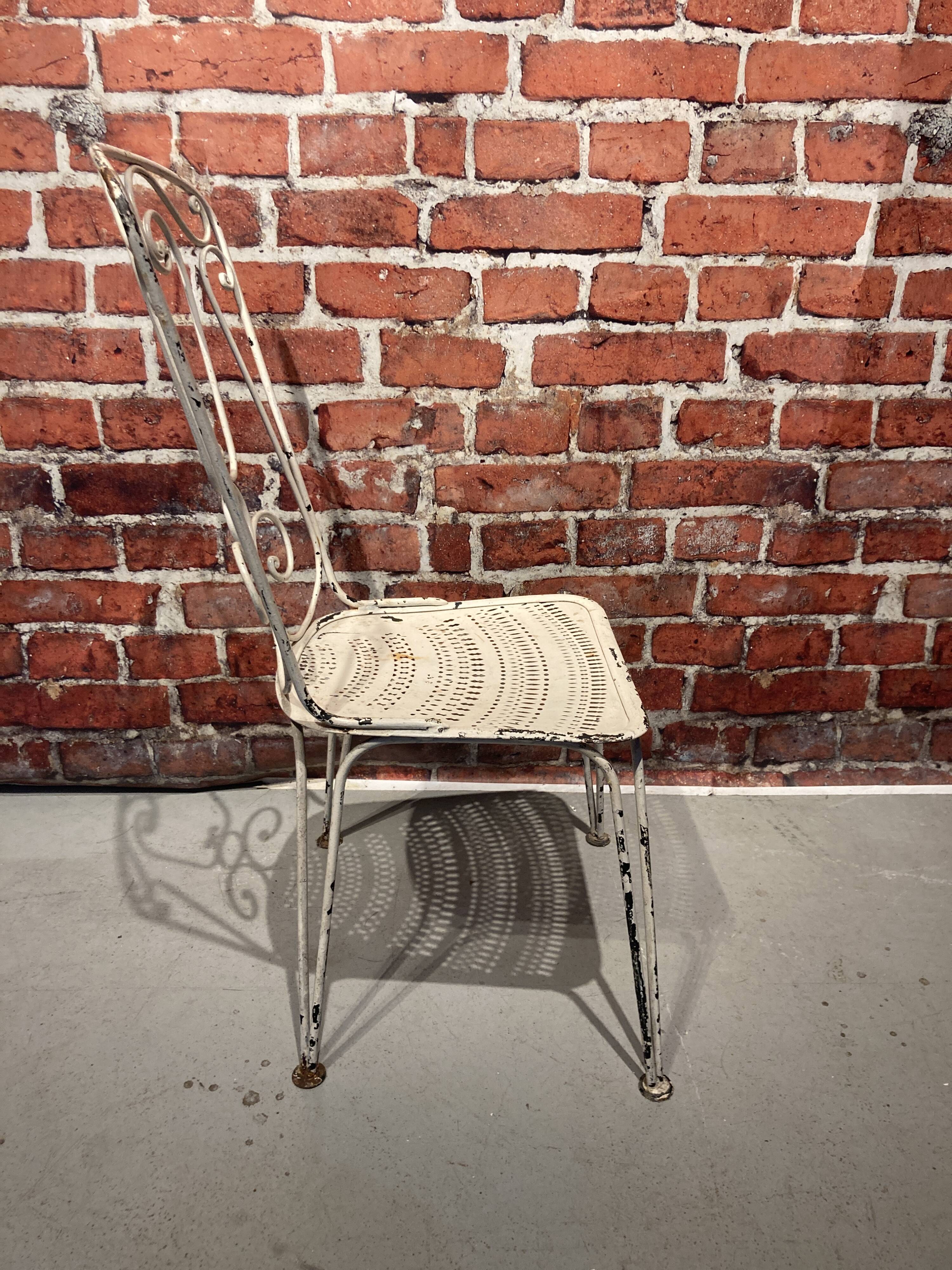 Wrought iron garden set painted white