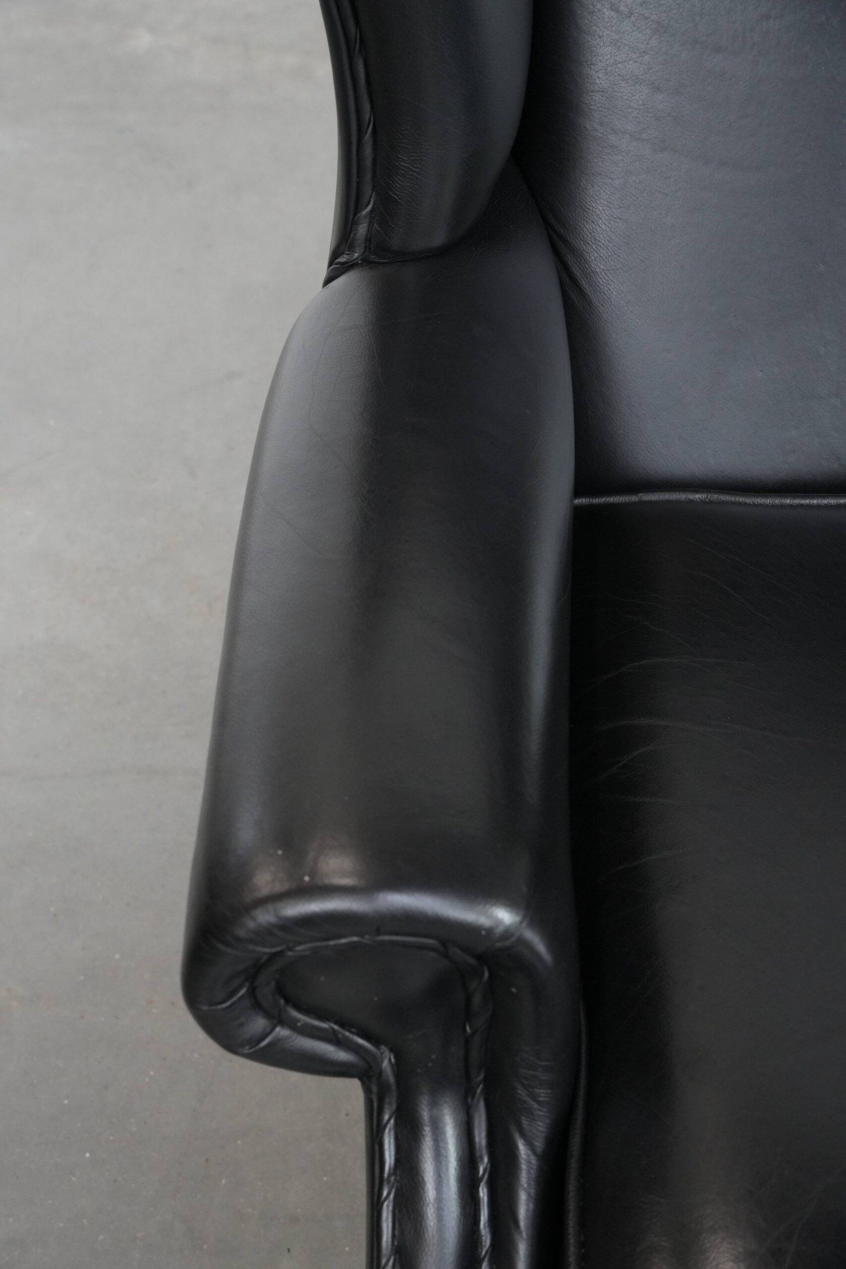 Black cowhide leather Chesterfield wingback chair in English style