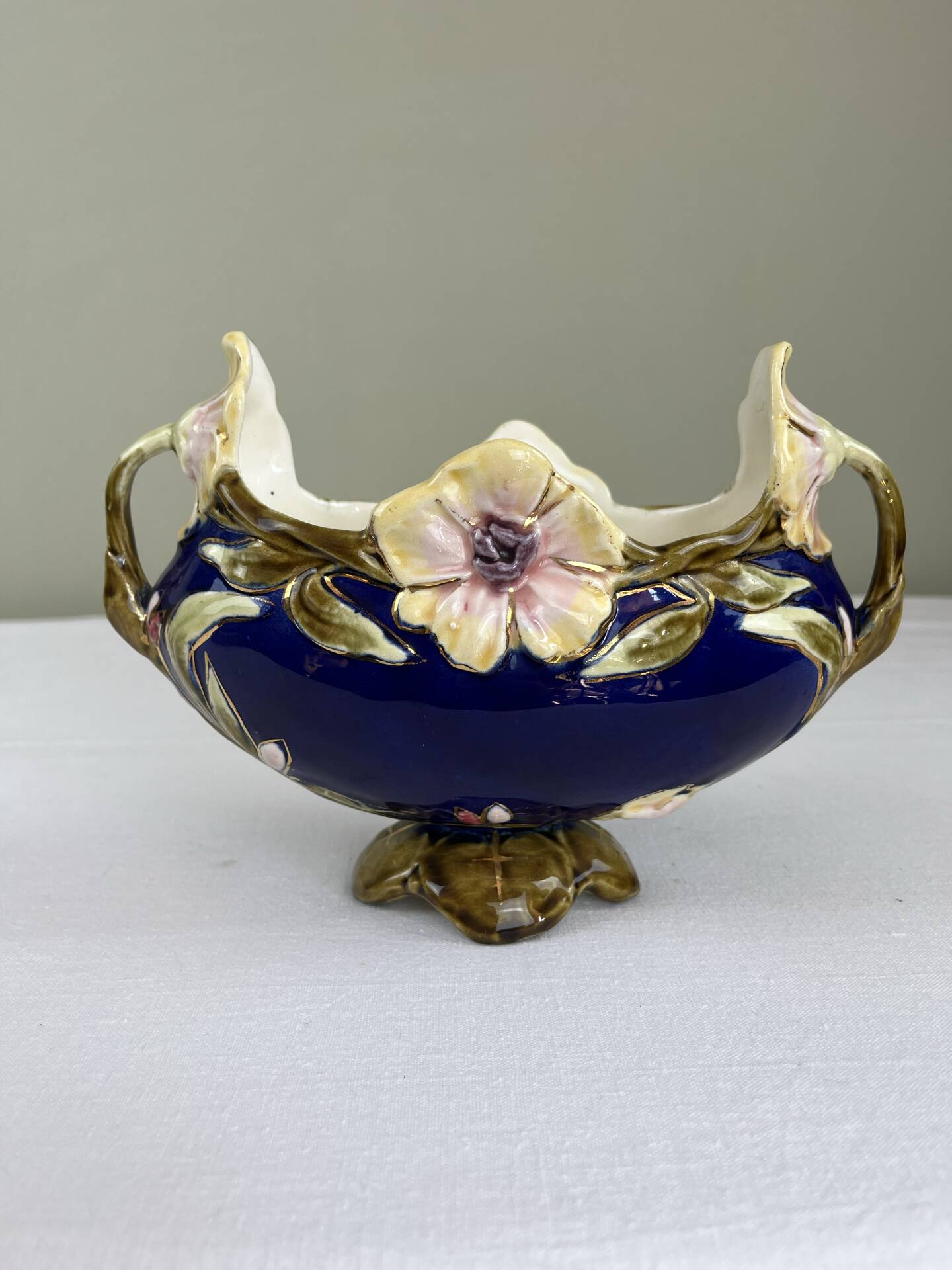 Art Nouveau navy blue barbotine bowl with raised floral decoration