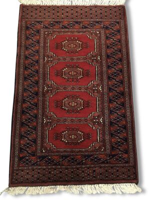 Tapis noué main excellent