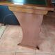 Wall-mounted writing table in cherry wood. retractable.