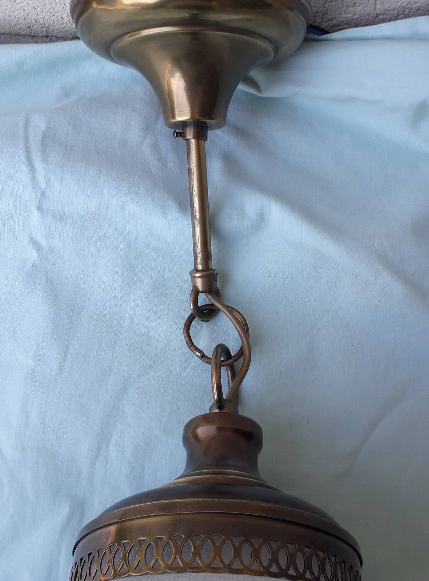 Glass and brass suspension