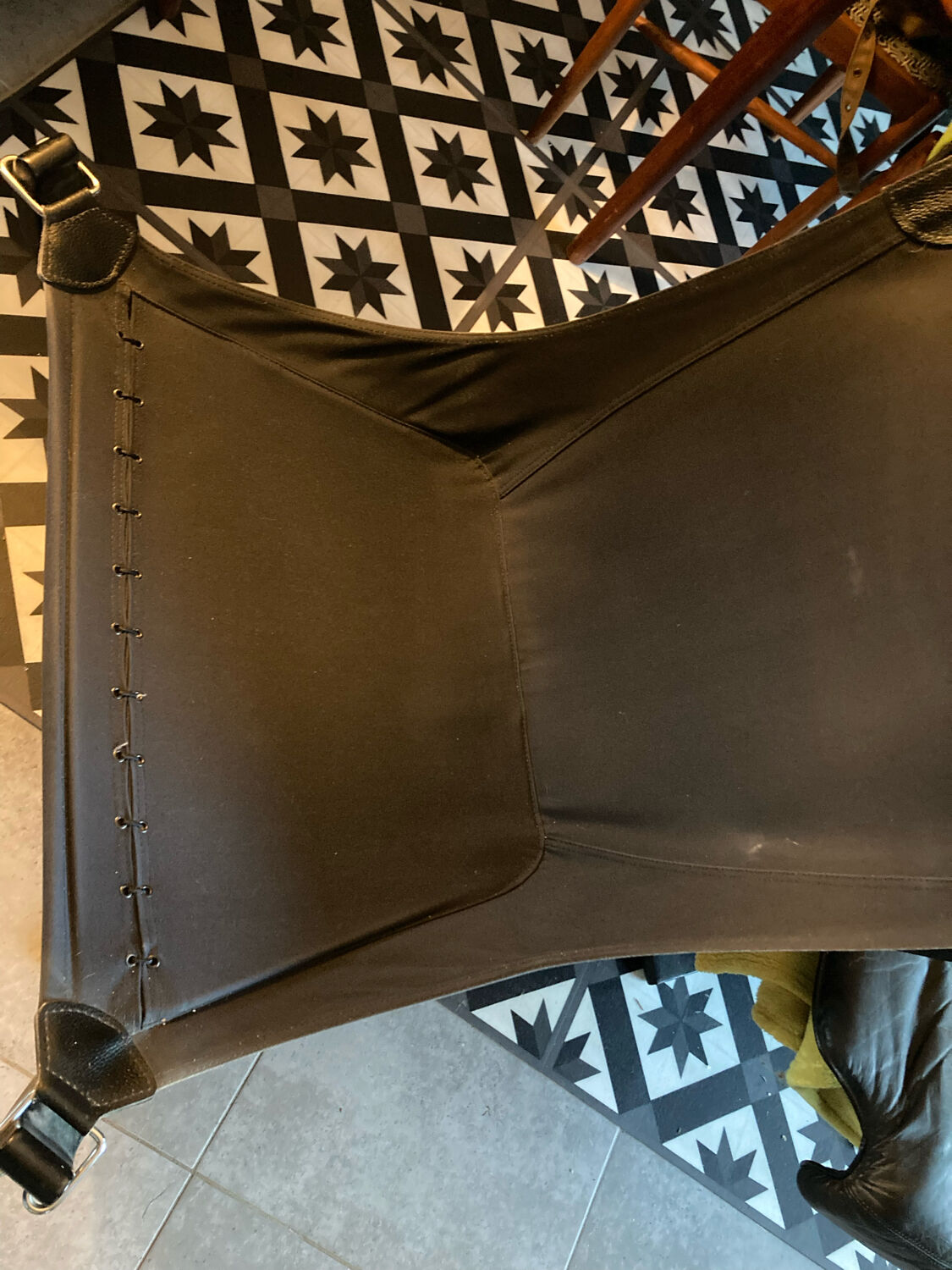 Leather Falcon armchair and footrest
