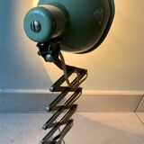 Workshop lamp on accordion arm.