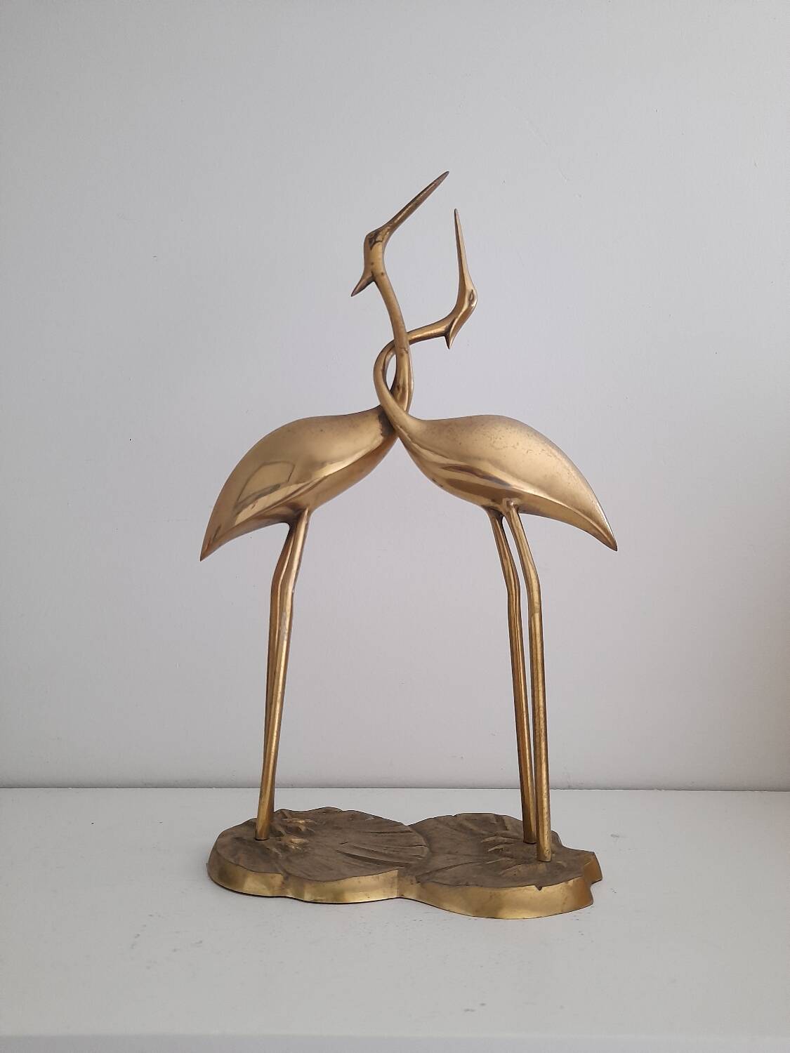 Couple of brass cranes