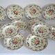 12 old Longchamp hollow plates with floral decoration