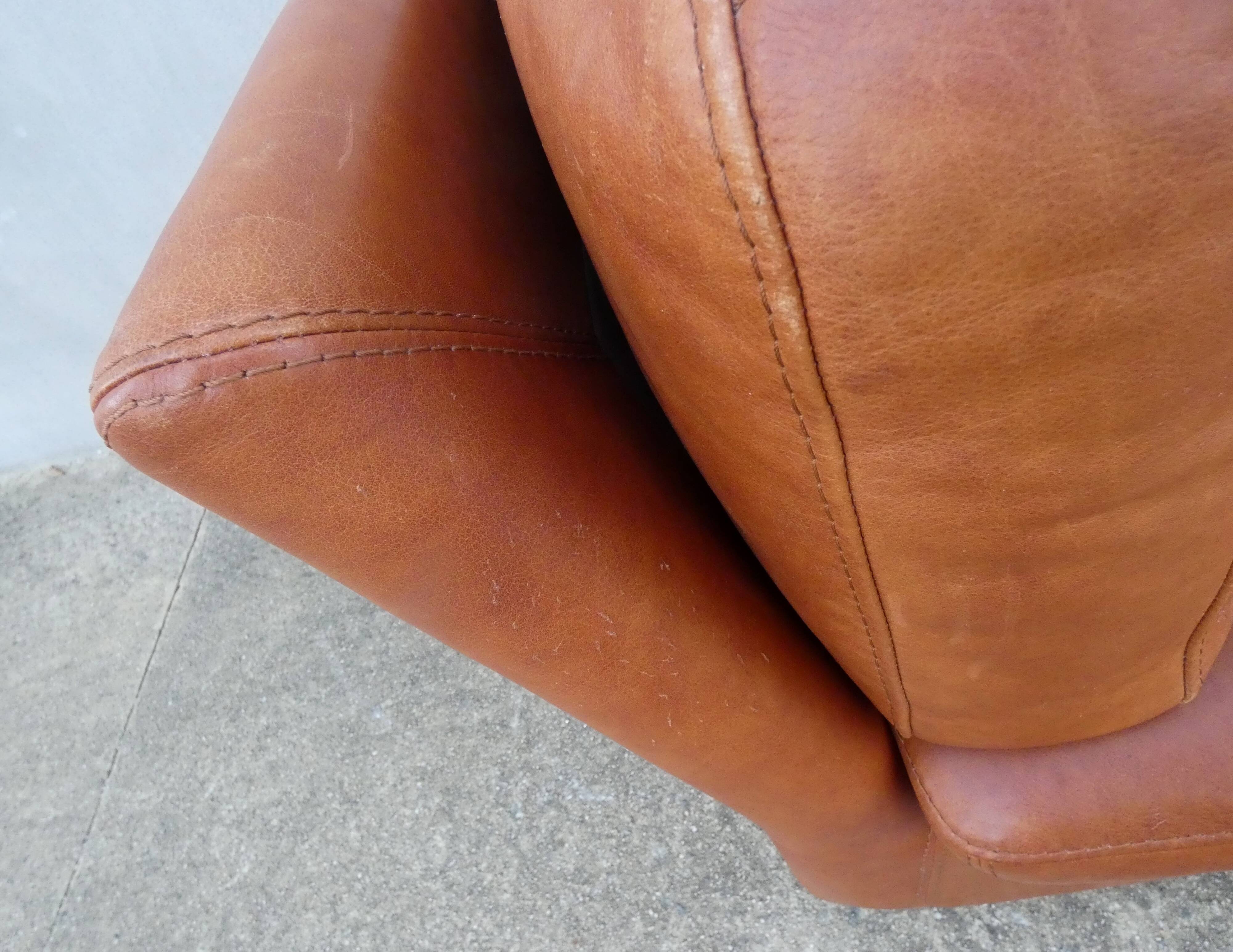 Vintage loft leather armchair DUVIVIER