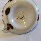 Cellar rat in old enamelled sheet metal