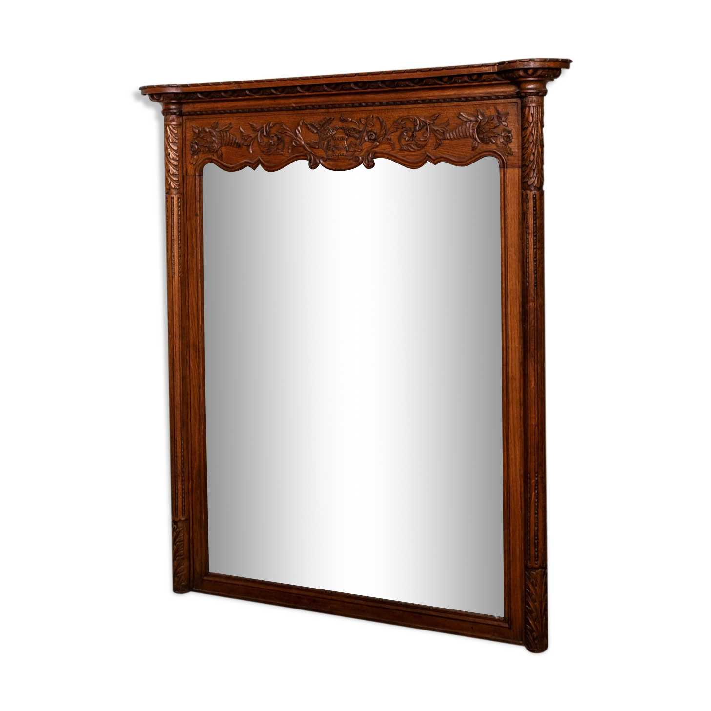 Beveled mirror in carved oak early twentieth century