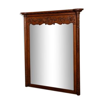 Beveled mirror in carved oak early twentieth century