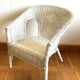 Vintage white rattan armchair