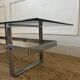 Table basse en acier chromé et plateau en verre fumé design 70