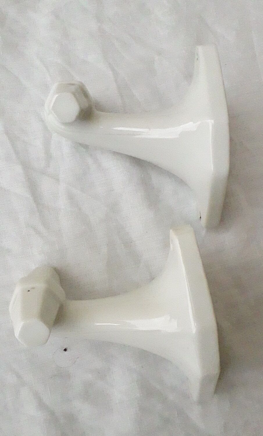 Pair of porcelain hooks