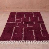 Traditional handmade Moroccan rug from Oued Zam, size 150x250 cm.