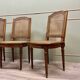 Suite Of Four Cane Chairs In Louis XVI Style Natural Wood