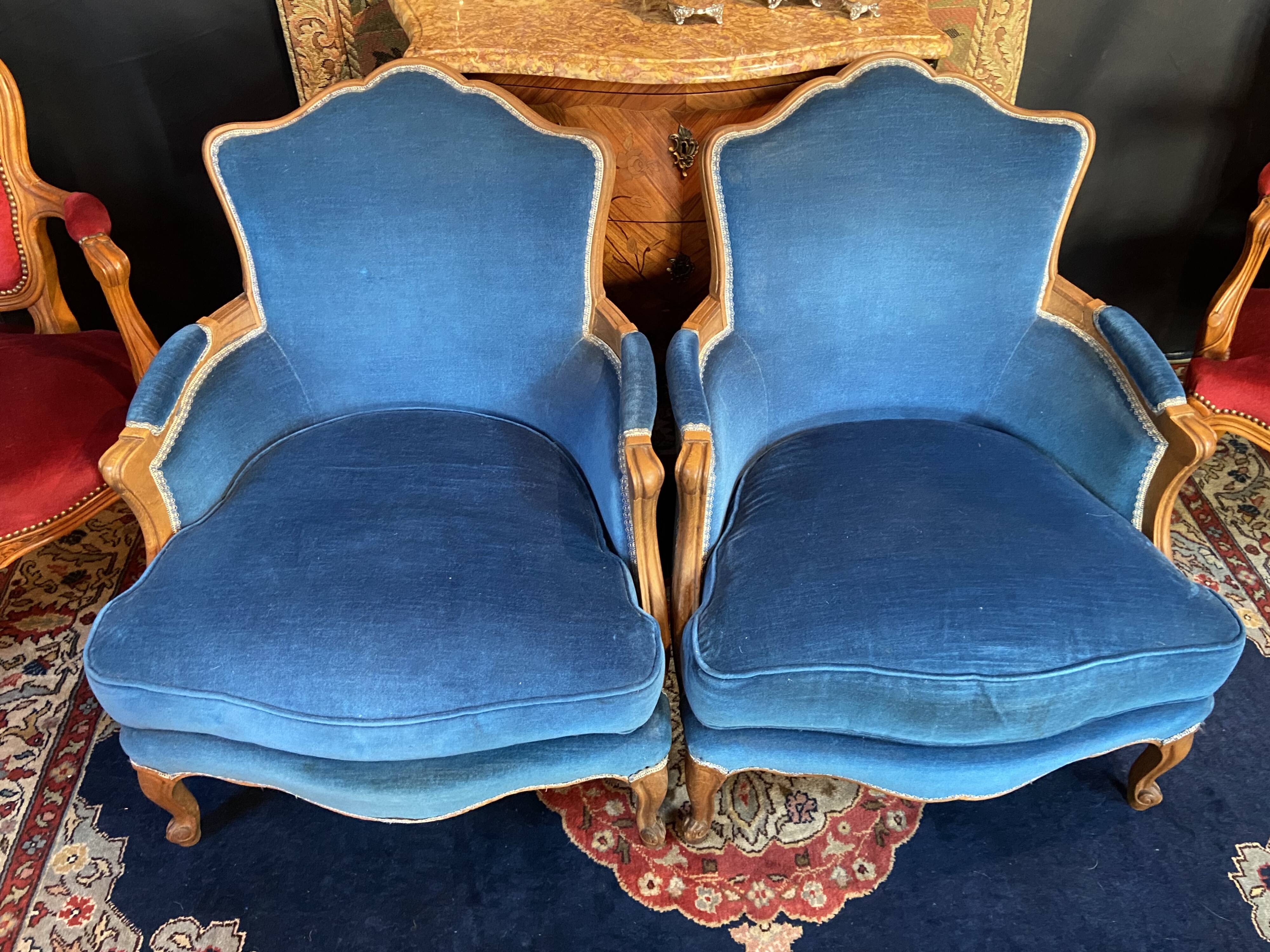 Pair of Louis XV style blue velvet bergère armchairs