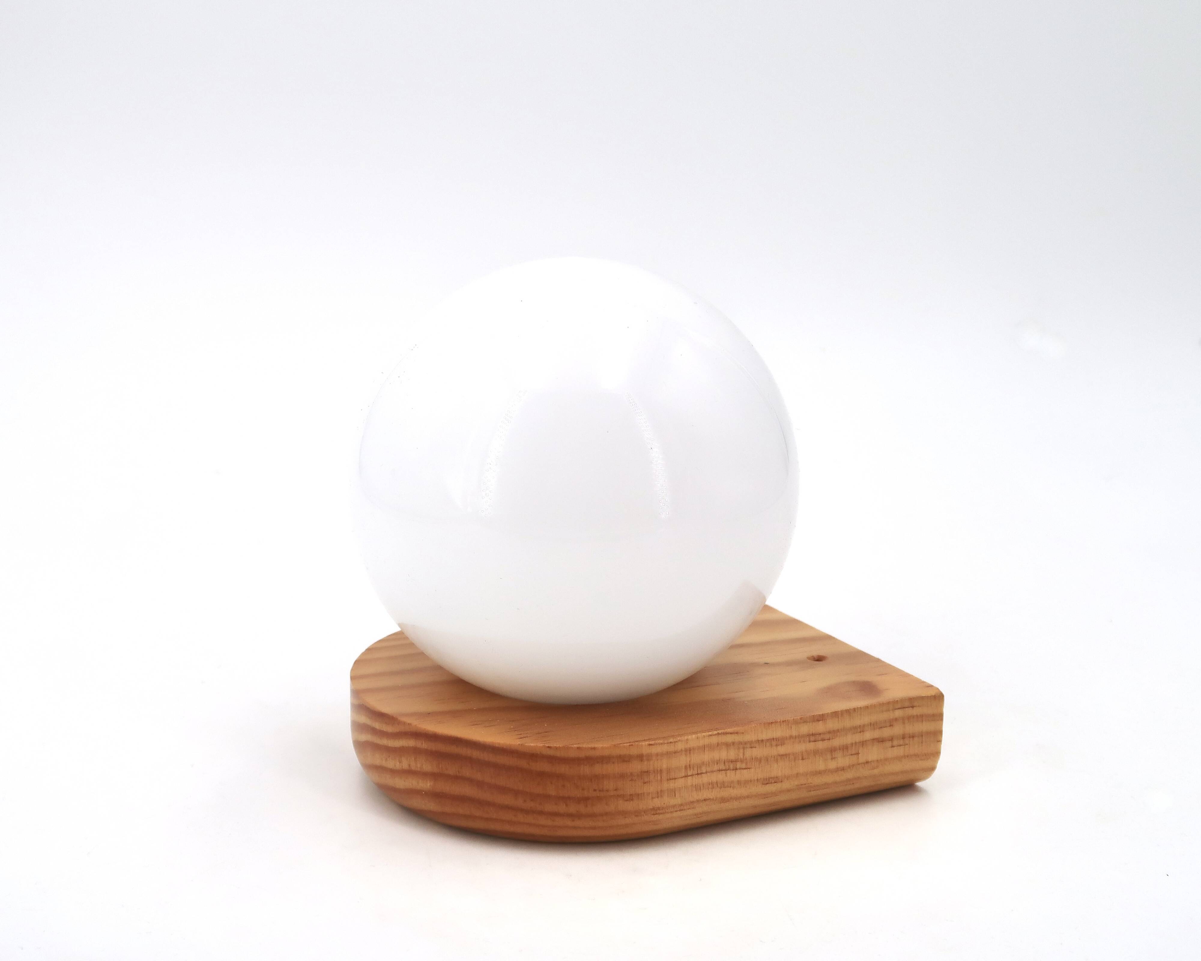 Wall light in pine wood with opaque white glass globe, 1980s